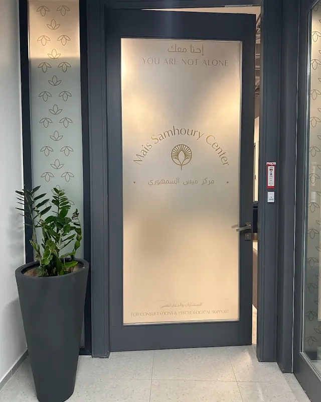 The center’s front door, with “You are not alone” written on it